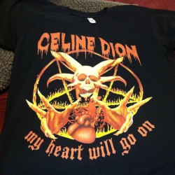 ruinedchildhood:  Celine Dion’s ‘My Heart Will Go On’ classic is immortalized as you’ve never seen it before on a t-shirt with the classic hard rock combo of skulls, fire and satanic symbolism.  AVAILABLE HERE 