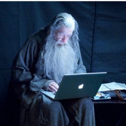 mrsrichardarmitage:stunningpicture:Gandalf checks his emails (behind the scenes in the set of the Hobbit)#The wizard will now install your software