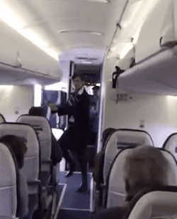 This flight attendant has the RIGHT MOVES! :)She’s poppin’ and lockin’ it to “Uptown Funk”!