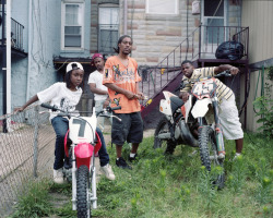 whitegirlsaintshit:  madeincharlie:This Is Baltimore: 12 O’Clock BoyzThe Twelve O’Clock Boys - a group of renegade dirt bike riders named for the signature trick they pride themselves on, frequently transforms the depressed streets of urban Baltimore