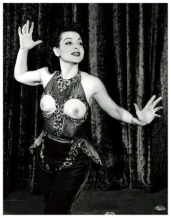 Rose La Rose     (aka. Rosina DaPello) A natural exhibitionist,&ndash; Rose was notorious for &ldquo;flashing&rdquo; the audience during her performances.. It’s safe to assume that she  made good use of this satiny red costume, which featured breakaway