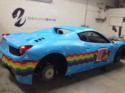 archiemcphee:  Check out this awesome meme on wheels. Deadmau5 recently had his Ferrari 458 Spider custom-wrapped in a Nyan Cat theme. But what sort of vanity plate best complements a luxury sports car decorated with the Interweb’s favorite Pop-Tart-bodie