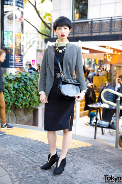 tokyo-fashion:  18-year-old Japanese student Meika on the street in Harajuku wearing a grey blazer from The Four-Eyed Tokyo over a black belted dress, pointy booties, and a black purse. Full Look