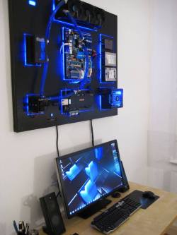 vixyhoovesmod:  asknodthenarcoleptic:  vixyhoovesmod:  scificity:  Wall-mounted water cooled PC  Unf~  First thought, ooh art. Second though, that frees up desk space from my PC.  unf to pc build, but of course something like that is always lacking….
