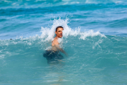 durbikins:  Obama returns back to the ocean, not because his job in finished, but simply because he is out of time. As a wave succumbs him back to the depths, Obama takes a final glimpse at the citizens whom he had once truly loved.  