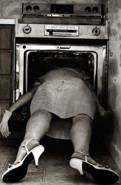 Sylvia Plath was found like this on the morning of 11 February 1963, dead of carbon monoxide poisoning in the kitchen with her head in the oven. She had sealed the rooms between herself and her sleeping children with wet towels and cloths. Plath then