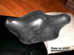 bootbrushpup:  There is something so beautifully abstract about the encased rubber form. The body transformed into a work of art: a fluid shape of curious mounds, curves and indentations. It barely resembles a body at all - and yet that amorphous nub