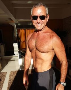 daddysbottom:  “Ready, dad?” I ask him as I grabbed a couple of beach towel off the table.“Yup, I’m all set!” he replies as he puts on his sunglasses. I look at him, and in the bright sunlight coming from the hotel window, this man looks like