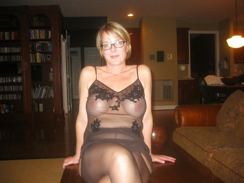 Mature wearing see through lingerie