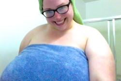 miss-maela:  Post shower selfie! That blue towel totally isn’t covering my back side, by the way. I’m holding it together behind my back, but my ass is fully on display. I need those huge bath sheet towels. They’re awesome.