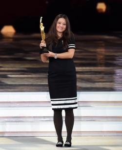 Chinese tennis star Li Na receiving the award for Best Female Athlete of the  Year at the annual CCTV Sports Awards in Beijing, on Feb 1,  2015. 