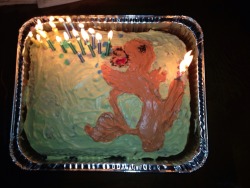 my attempt at making my man​ a charmander cake for his birthday 