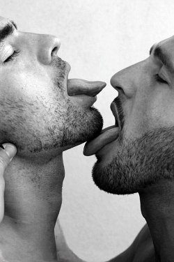 demoninthedark:  Tongue Lashing  Sexy boys licking each others&rsquo; scruff.