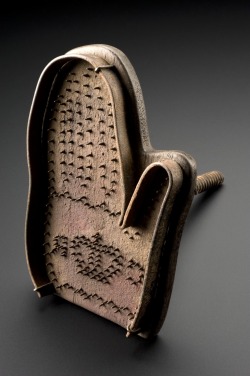 Hand brand for use Royalist deserters, 1640&rsquo;s. Made by the British Army during the English Civil War (1641-1651). Initials ‘CR’ surrounding a crown. This is presumed to refer to ‘Carolus Rex’ – King Charles I. This tool would have been