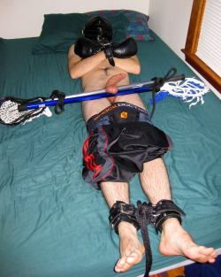 bondagejock:  When jocks play kinky #7 (dom side):  Once let out from my lacrosse pad mummification, I put this Chicago hockey jock in a comfortable leather hood and mitts to rest and recover.  I did not want him to think my fun was over, so I restrained