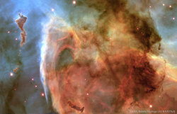 fyeahastropics:  The Keyhole in the Carina Nebula(via APOD;    Image Credit:   NASA,  Hubble Heritage  (AURA/STScI)  )  The dark dusty Keyhole Nebula gets its name from its unusual shape.   The looping Keyhole, in this  featured classic image by the 