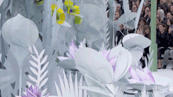 messgala:  It took six months to make the 300 flowers that decorated the Chanel set. Each of them had its own engine, and when at the show’s start Baptiste Giabiconi applied a theatrical splash from a CC-branded watering can and they simultaneously