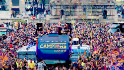 holamessi:  FC Barcelona players celebrate on an open top bus during their victory parade after winning the Spanish La Liga on May 15, 2016 in Barcelona, Spain. 
