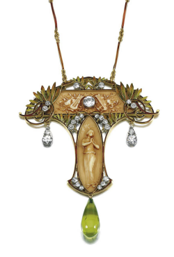 thirtyknives:  Pendant by Pierre-Georges DeRaisme. Circa 1900s. Gold, ivory, periodot, enamel, diamond. PIERRE-GEORGES DERAISME, 1900s The Art Nouveau pendant of open work foliate design decorated with green and brown enamel, framing two carved ivory