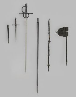 art-of-swords:  Rapier and Dagger Set Dated: circa 1620; possibly 19th century (dagger and sheath mounts) Culture: German Medium and Techniques: steel, leather, wood and silk, blackened/chased and embroidered Measurements: overall length of the rapier