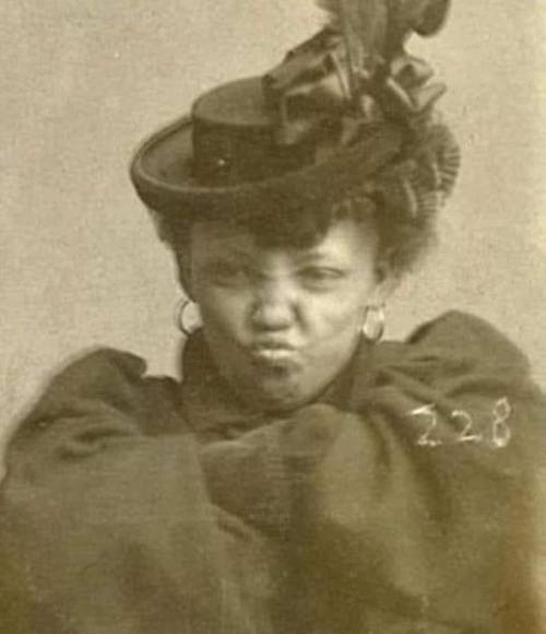 Goldie Williams, a rebellous woman who was arrested for vagrancy. She refused to unfold her arms and stop making this face for her 1898 mugshot. Nudes &amp; Noises  