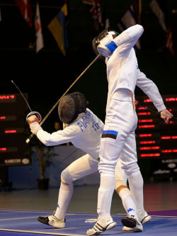 modernfencing:  [ID: two epee fencers in-fighting.] Rossella Fiamingo (left) against Irina Embrich, at the Challenge international de Saint-Maur 2013! Photo by Marie-Lan Nguyen. 