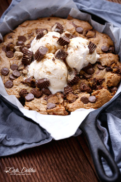 nom-food:  Reese’s nutella stuffed peanut butter deep dish chocolate chip skillet cookie