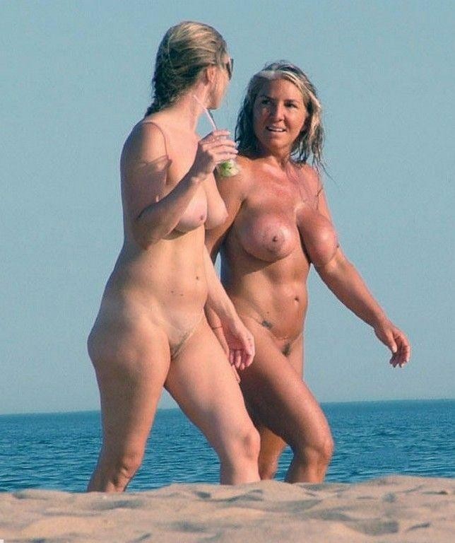 Mother and daughter at nude beach