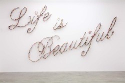 wetheurban:  ART: Knife Typography by Farhad Moshiri Iranian artist Farhad Moshiri creates his works by stabbing knives directly into gallery walls to form thought provoking statements.  Read More 