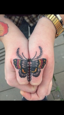 I Tattooed this death moth on my co-workers thumbs a bit back, this is a healed photo, still pleased with how they turned out :)