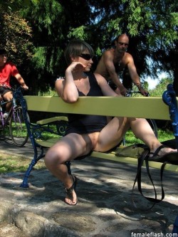 carelessnaked:In a park showing her bottomless pussy
