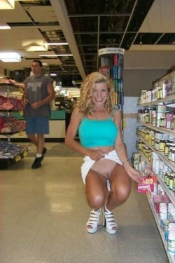 flashinginstores:  Poor dude has no idea the blonde MILF in front of him is flashing her pussy. He sure missed out.  Looks like she has some great tits too, would love to see them.  Do you have a hot MILF at home? Get her to flash you the next time