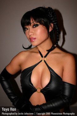 Yaya Han is a cosplay model and costume designer. In order to portray anime and cartoon characters that have big busts, she enhanced her tiny asian titties to 36D knockers!Â  Check out her website