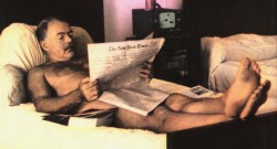 Papa likes to read the paper in the nude.