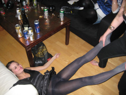 in-pantyhose:  partying girl in black pantyhose and short satin dress. Woman in pantyhose 