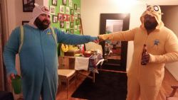 zerocub:  bruticub:  so the gays and lesbians in the building decided last minute to have a pajama party and watch the ball drop.   I own several onsies but i wanted to bring in the new year with my jake onesie.  Unknown to me Unionballs wore his Finn
