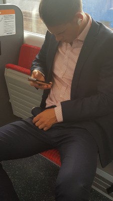hairypo:  suitman89:  Manspreading on the train, showing off his suited bulge…  Suited bulging crotch is soo hot, I am rubbing mine again now!