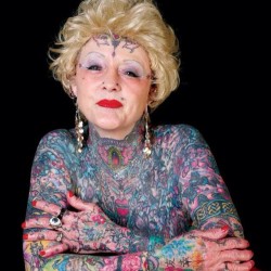 tattooworkers:  RIP Isobel Varley. Born 1937 in Yorkshire, England, she was a Guinness Book of World Records holder for most tattooed senior.