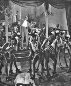 updownsmilefrown:  Cab Calloway and his orchestra with the Cotton Club Chorus at the Cotton Club, 1936. 