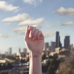 open-blue-eyes:  digbicks:  Tiny Tattoos, Austin Tott  American photographer Austin Tott has captured a series of images that match miniature, hand-drawn body art to backgrounds from which they draw visual reference. Tiny tattoos are outlined onto the