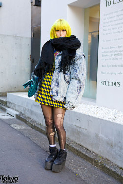 tokyo-fashion:  23-year-old Murakami on the street in Harajuku with yellow bob hairstyle, blue lipstick, oversized resale acid wash jacket, Jeremy Scott x Swatch watch, ripped tights &amp; YRU platforms. Full Look