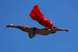 nelsoncarpenter:  elcomfortador: This is one of the L.A. Times featured photos of the day. Caption: “Barcelona — Michal Navratil of the Czech Republic soars through the air while competing in the men’s 27-meter high dive at the FINA World Championships.” 