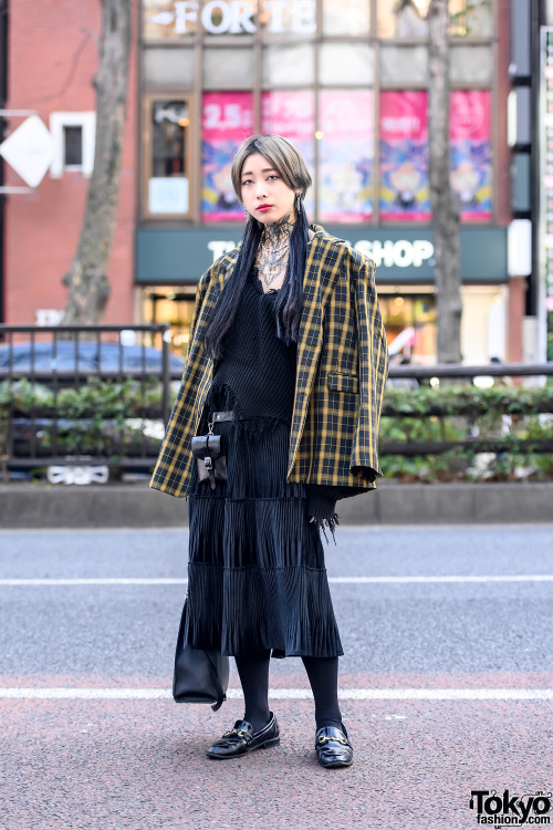 tokyo-fashion: 21-year-old Japanese tattoo model Chihiro on the street in Harajuku wearing a Beep jacket over a Never Mind The XU ripped sweater, a skirt from Korea, Rosen Kreuz and Open The Door accessories, and loafers. Full Look