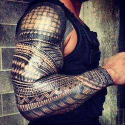 deanambgross-deactivated2014052:  Today on Superstar Sunday Ink - One look at Roman Reigns’s right arm sleeve Samoan Tribal tattoo. It took artist Mike Fatutoa 17 hours to complete. #WWE (WWE @ instagram)   Badass tattoo!