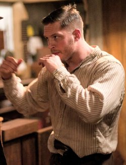 charlidos:  Tom Hardy in Lawless - because I’ve got such a soft spot for that hair! Particularly with that little tuft of hair sticking up, it’s adorable.  Tom Hardy was hot as fuck in Lawless. I don&rsquo;t even care.