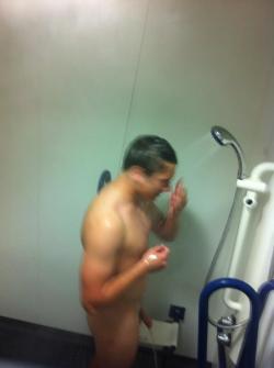hornybritguy:  Straight guy taking a shower while friend sneaks a pic of his tasty cock out and uploads to facebook 
