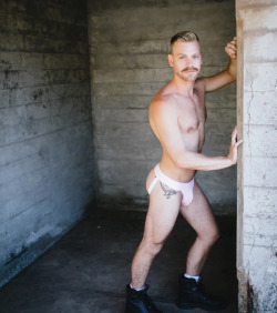 hunterwilliams89:  androphilecollective:Living manfully - http://androphilecollective.tumblr.com Oh it’s me. Just hanging out in a bunker in my jock. The photo is by @matthewdeanstewart &lt;3   Wow!