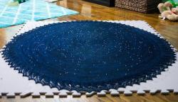 jumpingjacktrash:  monthofmay:  Redditor’s wife knitted a beautiful star chart shawl.  this is the pattern i just reblogged the ravelry link to, except they apparently left out the yarnover eyelets, and i think i like it better. 