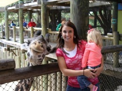 lulz-time:  devildoll: the giraffe is much more interested in being in this photo than the kid is  My lovely followers, please follow this blog immediately!