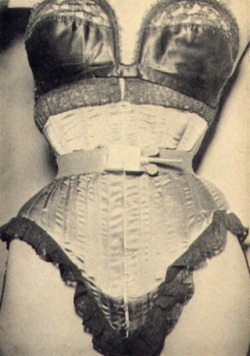 undressingparlour: Corset with metal waist cinch, screw and wingnut from Exotique Magazine, c. 1950s Can someone buy me a corset too?